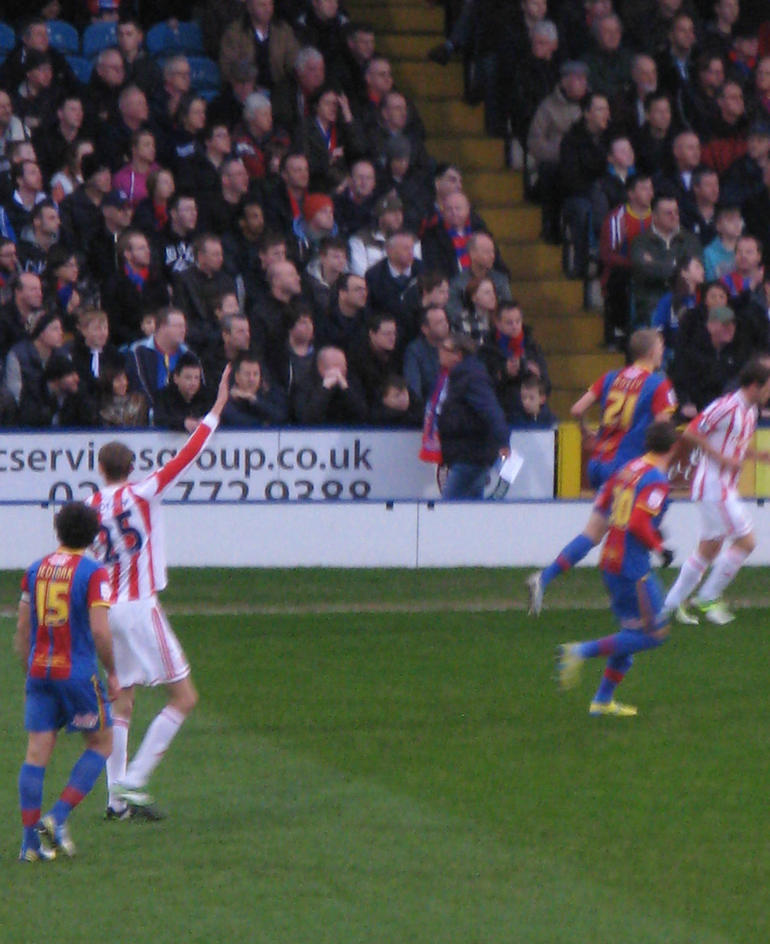 Stoke's Peter Crouch waves to his mum in the Main Stand