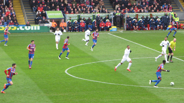 On the ball... Wilfried Zaha runs at the QPR goal. He scored the first in Palace's 3-1 win