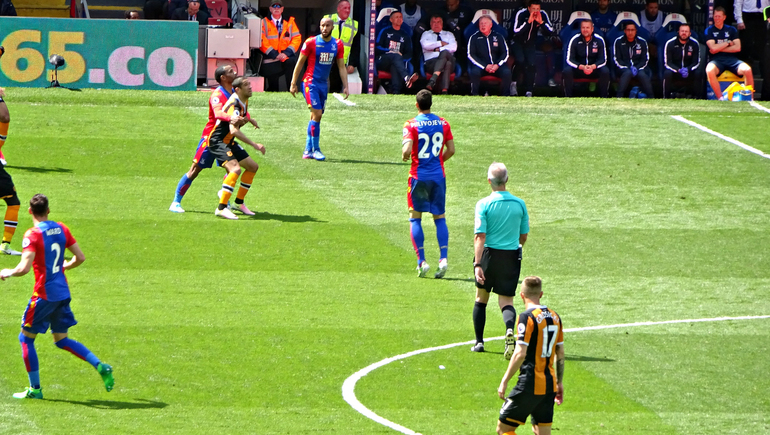 Punch grapples with a Tiger during the 4-0 victory over visitors, Hull City.