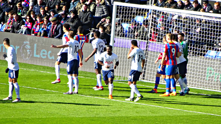 New Norwegian striker Alexander Sorloth (No 9) jostles with defenders in the Tottenham area.