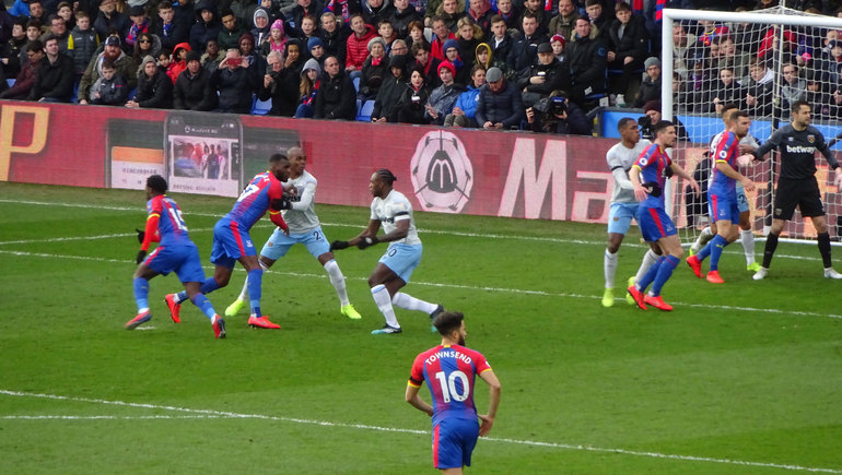 Townsend (No 10) runs at the Hammers goal as the Eagles deliver a first-half corner