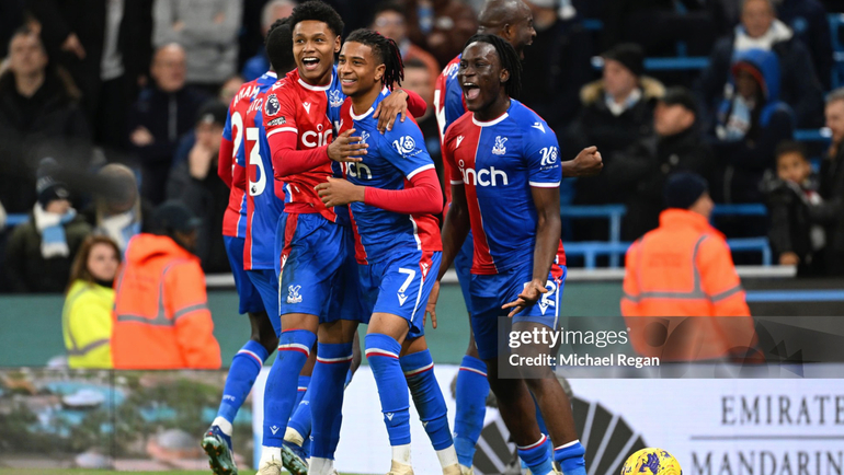 Michael Olise celebrates after securing a point for the Eagles in stoppage time