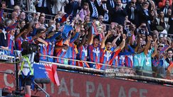 Joel Ward lifts the FA Cup trophy