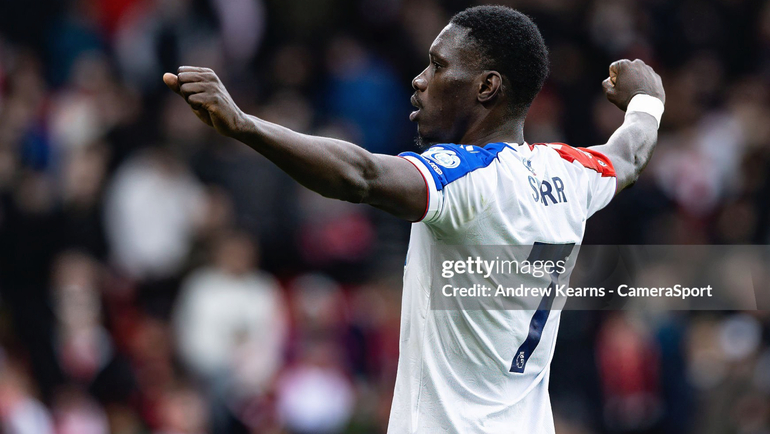 Sarr celebrates after scoring a penalty just before half time