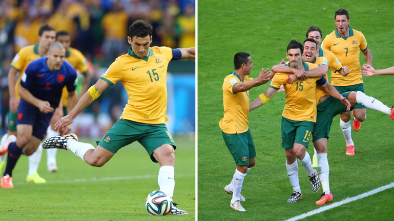 Mile Jedinak scores and celebrates his penalty for Australia against Holland