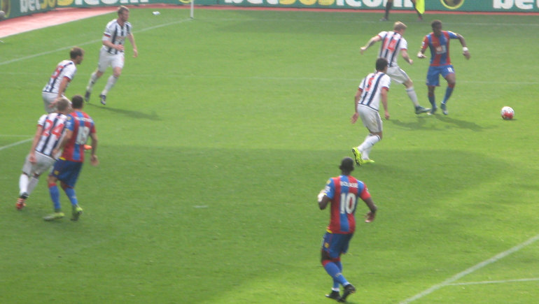 Yannick Bolasie lurks near the Baggies' goal before nodding in the first