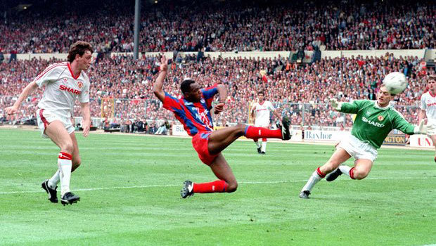 Ian Wright scores his second against United