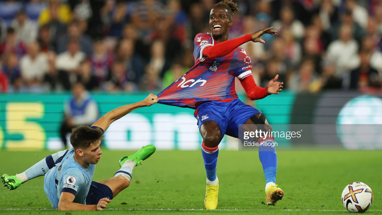 Zaha having his shirt pulled in the second half