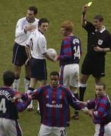 Ben Watson gets booked as Palace line up a wall