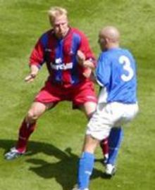 Aki holds off Ipswich's Matt Richards