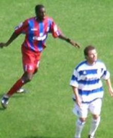 Darren Powell keeps an eye on Kevin Gallen