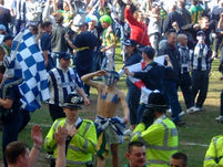 A West Brom fan with blue and white war paint!