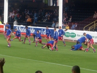 The Palace players warm up before the match