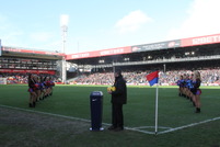 View of a player entering on the pitch at the begining of the match.