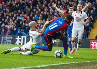 Wilf dragged down (Photo by Andy Roberts)