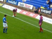 Julian Gray looks on as Craig Harrison goes to take a throw-in