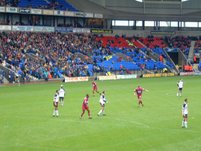 Players wait for a freekick to be taken