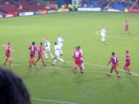 The Palace players prepare to attack a freekick