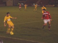 Tommy Black plays the ball down the line