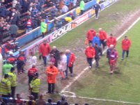 Players walk towards the tunnel at half time