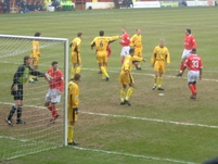 The Palace players prepare to defend a corner