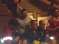 Kevin 'Fatboy' Miller runs off the pitch after being goaded by the Palace fans near the tunnel