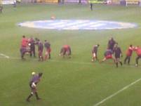 Palace players warmup before the start of the match