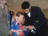 Jobi,Sam and his sister Becky,in the players lounge