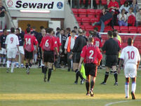 Its half time, and the players leave the field