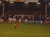 A Walsall freekick gets blocked by the Palace wall