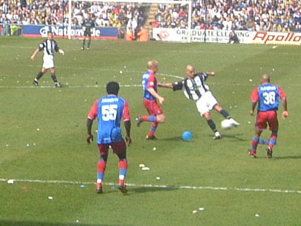 Aki Riihilahti attempts to challenge for the ball.