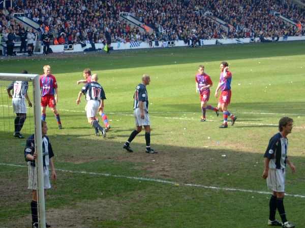The players prepare to meet a Tommy Black corner.