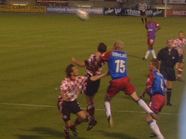 Aki Riihilahti goes in with a header