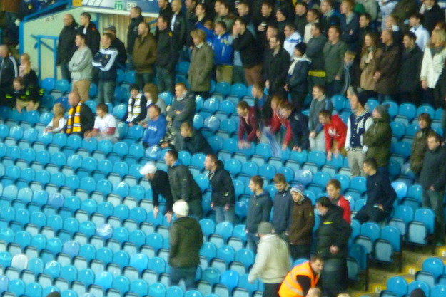 Leeds fans bang on seats to create some atmosphere