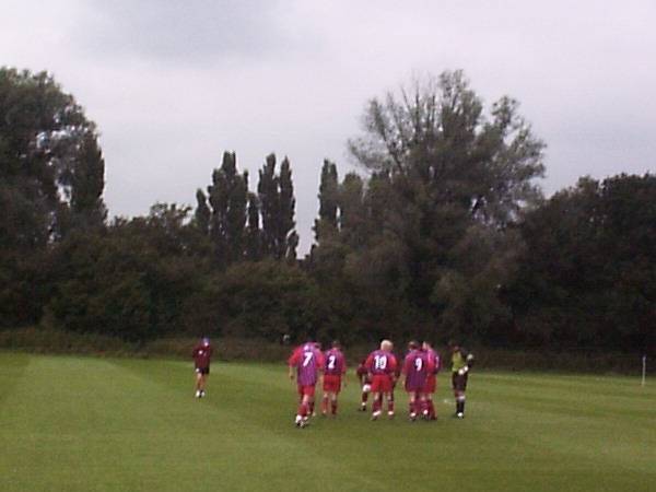 Palace players discuss tactics before the game