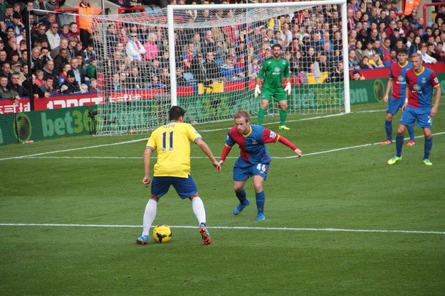 Bannan defending vs Ozil