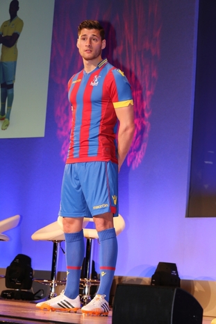 Joel Ward models the new home kit for Season 14/15