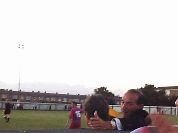 New manager Alan Smith talks to Steve Kember during the second half