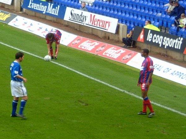 Julian Gray looks on as Craig Harrison goes to take a throw-in