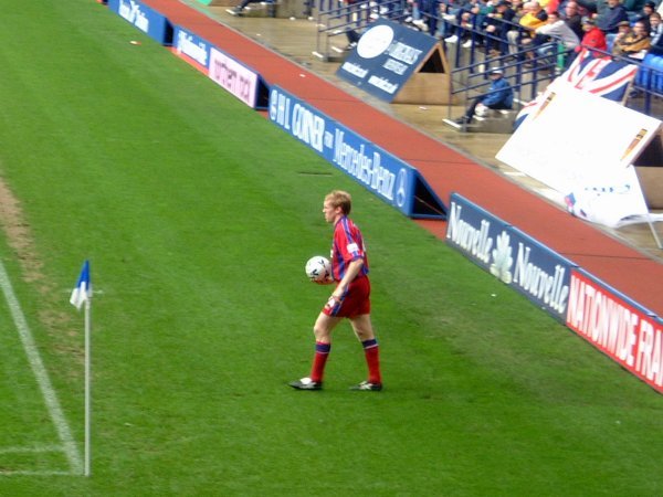 Palace's Steve Staunton takes a throw-in