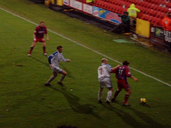 Tommy Black holds the ball up, attempting to waste a bit of time