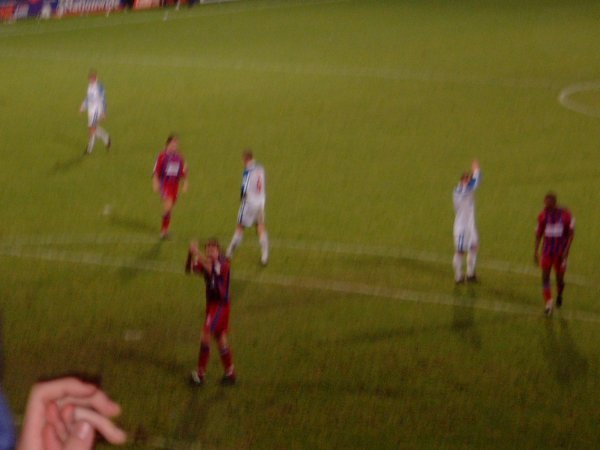 Its all over, and the Palace players applaud the supporters