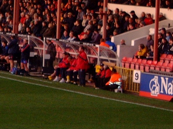 Alan Smith and his men watch the match closely from the side