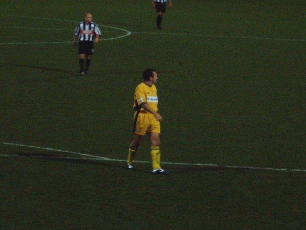 Neil Ruddock watches the play