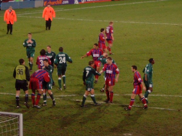 Players shake hands after the game