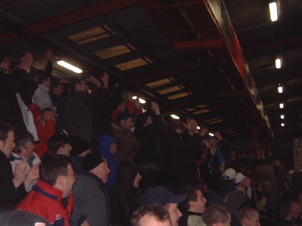 The travelling support celebrate Freedman's late goal
