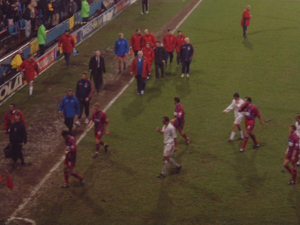 Players walk towards the tunnel at half time