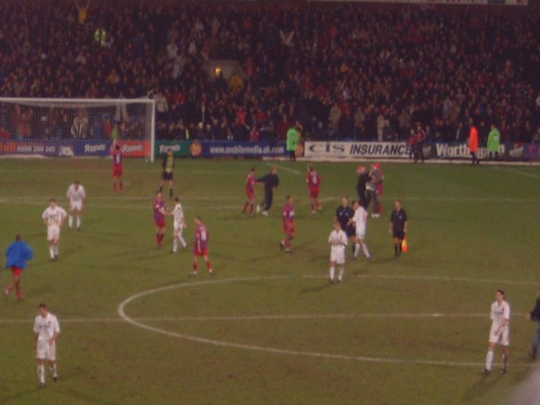 Players shake hands after the game