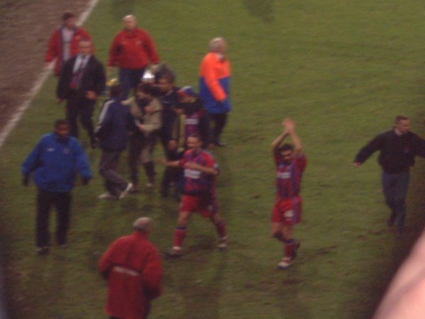 Players applaud the crowd in the Holmesdale Road stand