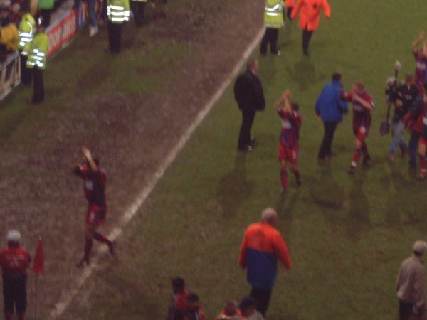 Players applaud the crowd in the Holmesdale Road stand